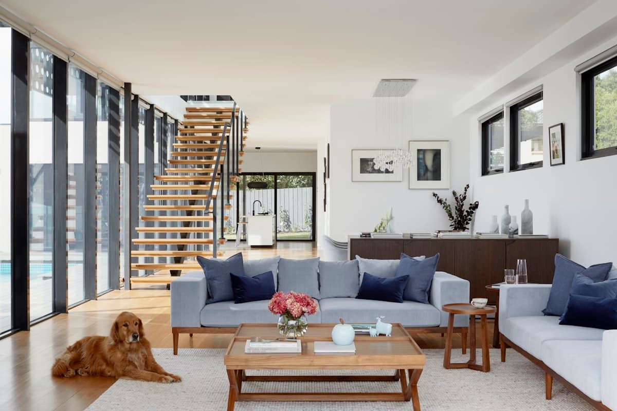 Bright open-plan living room with floor-to-ceiling windows