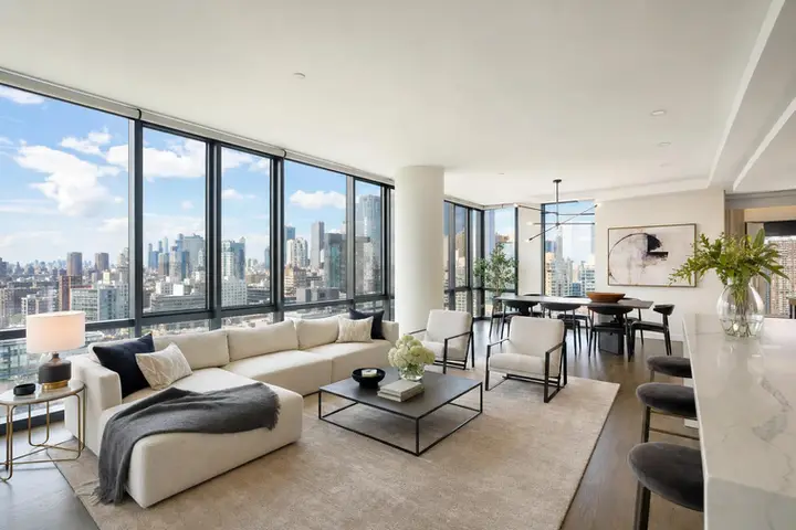 Modern NYC skyscraper exteriors with reflective glass and sharp lines captured by an architectural photographer